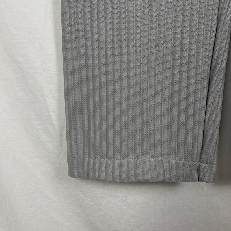 ISSEY MIYAKE HOMME PLISSE PERFORATED PANTS