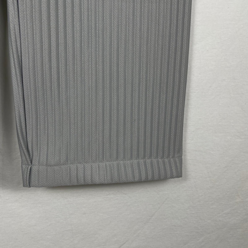 ISSEY MIYAKE HOMME PLISSE PERFORATED PANTS