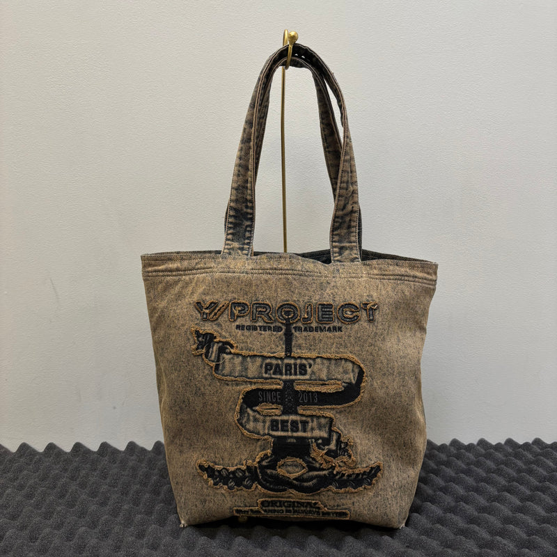 Y/Project Paris’ Best Distressed Denim Tote Bag