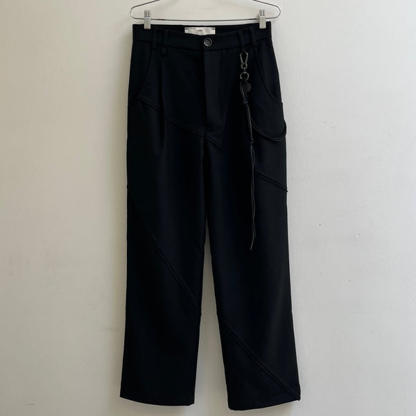 SS26 Song For The Mute Slash Loose Pleated Trousers